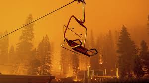 Gridlock on highway 50 eastbound through south lake tahoe, calif., as the town goes under an evacuation order because of the caldor fire, monday, aug. 49soviuwxow1vm