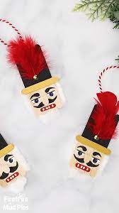 How To Make A Popsicle Stick Nutcracker Ornament Christmas Ornament Crafts Kids Christmas Christmas Crafts