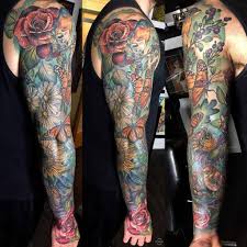 With the compact scattering of wild flowers surrounding the center piece rose growing in their midst, this tattoo presents an. The Ultimate 137 Best Sleeve Tattoos In 2021