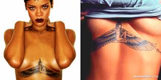 Each one of these tattoos has a very special the stars on her back make her look more good that's why she got them. Tattoos Rihanna Daily