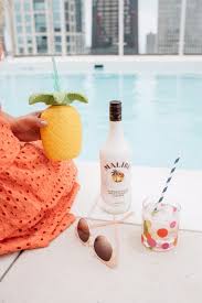 Shake and strain into a wine glass filled with crushed ice. Malibu Rum Summer Coconut Cooler Cocktail Recipe Bows Sequins