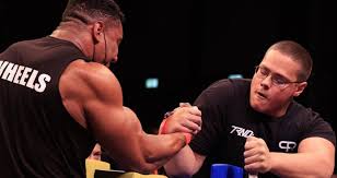The hook is simpler, but not as effective if your opponent is. Larry Wheels Is Defeated By Schoolboy In Arm Wrestling Match