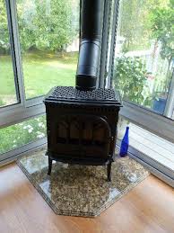 Jotul Direct Vent Gas Stove And Hearth Pad By Rettinger Fireplace Systems Wood Stove Fireplace Wood Stove Hearth Hearth Pad