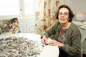 They're equally good for kids learning how to spell, for adults wanting to stimulate their mind, or for senior citizens looking to keep their minds sharp. Old Lady Sitting At Table In Stock Image Colourbox