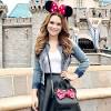 The minnie mouse bow clasp clutch boasts the iconic mouse ears and is covered. 1