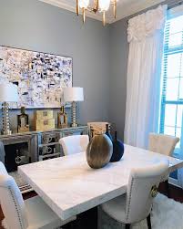 The distinctive curves of andy suspension lamp create an impressive lighting piece for romantic living rooms. American Signature Furniture Our Artemis Table Our Angelina Sideboard Gorgeouslycoveted Style Her Hand Painted Vases One Stunning Space Designerlooks Myasf Facebook