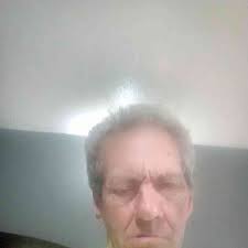 How to properly install siding around a half-round window?