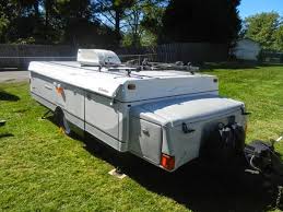 Level up a window seat by adding a trundle bed. This Is Our One Week Pop Up Camper Remodel