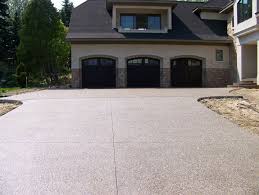 The term exposed aggregate is exactly that. Exposed Aggregate Driveway Archives Mazza Concrete Michigan Concrete Service