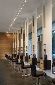 Row Of Salon Chairs In The Morning Light Salon Interior Design Hair Salon Interior Beauty Salon Decor