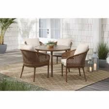 Perfect for a comfortable chat or casual drinks, this set includes a coffee table, a loveseat and two lounge chairs with charcoal cushions. Fashion Look Featuring West Elm Umbrellas By Kinseywalsh Shopstyle