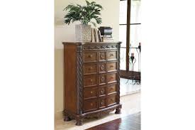 Inlaid marble veneer caps on panel footboard. North Shore Chest Of Drawers Ashley Furniture Homestore
