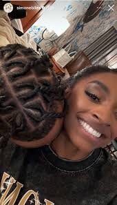 Simone Biles Posts Photo of Husband Jonathan Owens Kissing Her Neck