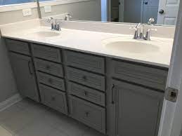 This small but mighty 60's bathroom packs in lots of style in minimal square footage. Lillian Stone Gray Cabinets With White Cultured Marble House Bathrooms Grey Cabinets Building A House