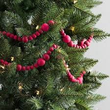 This Classic Red Wood Bead Garland Will Look Great Draped Across Your Mantle Or Str Bead Garland Christmas Tree Christmas Tree Decorations Christmas Tree Beads