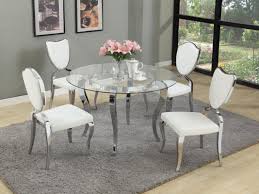Round Glass Dining Table With Chrome Base And White Chairs Bring A Modern Desig Glass Round Dining Table Round Glass Dining Room Table Round Dining Table Sets