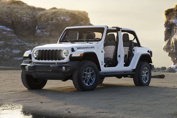 Jeep Wrangler 4xe off-roading on a rocky trail