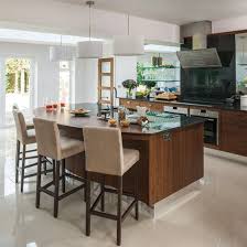 From tankards for 18ths to vases for 80ths, we've got something for everyone. Modern Glass And Walnut Kitchen With Breakfast Bar Kitchen Decorating Ideal Home Small Kitchen Decor Cheap Kitchen Decor Modern Kitchen Pictures