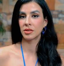 Saying Micah's partner looks trans has nothing to do with being pretty or  not pretty. She's extremely attractive. It's not just the way she looks.  It's her voice, mannerisms, the look in