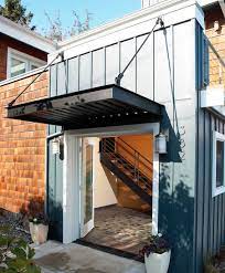 Suspended Metal Awning Industrial Exterior Design House Exterior Exterior House Siding