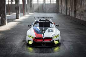 Bmw's new black and white badge is a sign of things to come. White Black And Red Sports Racing Car Hd Wallpaper Wallpaper Flare
