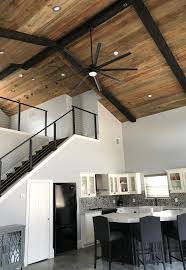 Shiplap ceiling kitchen if your space has gorgeous gabled ceiling like this example, you can spice it up more by using boards to add texture and bring more attention to the. Check Out This Great Interior Using Our Pine Shiplap Stained This Dark Color It Really Makes A Stat Wood Beam Ceiling Vaulted Ceiling Living Room White Walls