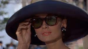 Karlie Kloss Poses For The Coveteur Names Audrey Hepburn As Her Style Inspiration Audrey Hepburn Sunglasses Hepburn Style