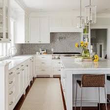 We have numerous backsplash ideas for kitchen with white cabinets for you to choose. White Kitchen Cabinets Grey Backsplash Design Ideas