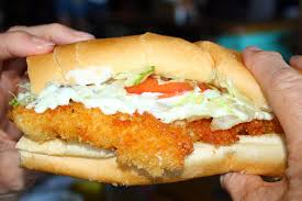 Find your game on one of our 11 tv's and listen live via audiofetch. Man V Food S Adam Richmond Visits Hogfish Bar Grill Shoestring Weekends Blog