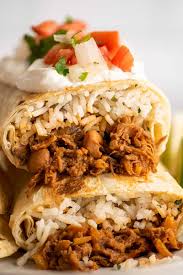 This simple shredded beef recipe is seasoned with pantry spices, aromatics and a secret cheater ingredient. Shredded Beef Burritos Baking Mischief