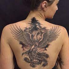 Perhaps the only time colored wing tattoos look great is when the design is based on bird wings to symbolize freedom. 60 Incredible Phoenix Tattoo Designs You Need To See Spiritustattoo Com Phoenix Tattoo Design Phoenix Tattoo Phoenix Back Tattoo