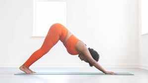 Why Heels Down In Down Dog Isn T A Useful Cue For Everyone Downward Dog Shoulder Stretch Leg Stretching