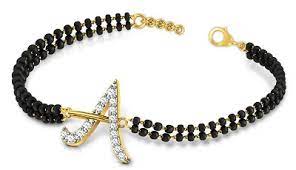 Each and every design is created with innovative concepts, . 10 Latest Alphabet And Letter Name Mangalsutra Designs
