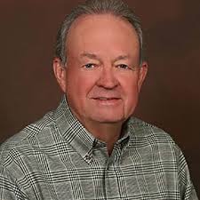 A bald eagle sits in a tree in Fredericksburg, Virginia underneath  Tuesday's super pink moon.