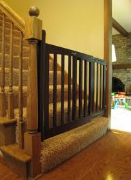 Banister and stair gate with dual installation kit. Safety Gates For Stairs Stair Design Ideas
