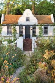 Cape Dutch Homestead At Sunset Viewed From The Fynbos Dutch House Cape Dutch Chelsea Flower Show