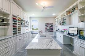White Melamine Craft Room With Raised Panel Door And Drawer Fronts And Crown Molding Multiple Work Sewing Room Design Dream Craft Room Craft Room Organization