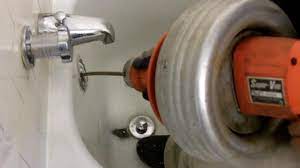 You have to disconnect and. How To Snake Bathtub Drain Through Overflow With Electric Auger Youtube
