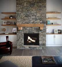 Farmhouse Modern Boho Living Room Fireplace Stone Veneers Wood Mantel Stacked Stone Fireplaces Living Room With Fireplace Fireplace Design