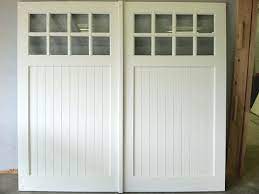 White Painted Swing Out Garage Doors Plans Home Interiors Garage Doors Wood Garage Doors Wooden Garage Doors