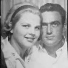 Who is the man with blonde hair and blue eyes?