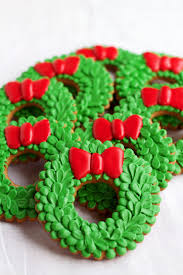 These guys were so fun to decorate, with fairly straightforward designs and fun, bright colors. Christmas Wreath Cookies The Bearfoot Baker