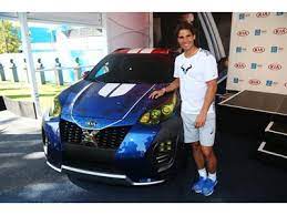 Kia celebra la longeva partnership con gli australian open consegnando, con rafael nadal protagonista, una flotta di 130 veicoli a disposizione. Rafael Nadal Unveils Kia X Car 1