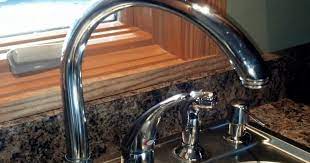 Faucet is leaking or dripping from the spout. How To Fix Leaking Moen High Arc Kitchen Faucet Diy