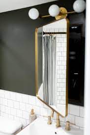 It is made of wood and fitted with mirrored doors. How To Turn A Mirror Into A Medicine Cabinet Diy Bathroom Medicine Cabinet Hgtv
