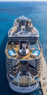 Oasis Of The Seas Extraordinary At First Sight With A Design That Blends The Beauty Of The Open Ocean With S Oasis Cruise Royal Caribbean Cruise Cruise Ship