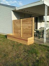 Designed to create a rustic backyard look and feel with a raw split bamboo fence that is spaced enough to allow for some filtered light, yet adding some privacy to feel secluded. Free Standing Screen With Planter Backyard Privacy Backyard Patio Outdoor Privacy