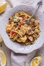 This Creamy Lemon And Fresh Tomato Salmon Pasta Is A Fresh And Decadent Pasta Dish That S Ready In Only Salmon Pasta Recipes Salmon Pasta Smoked Salmon Recipes