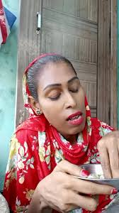 Grinding Spices in a Floral Pattern Outfit