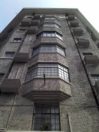 常熟路209弄1 4号 原名赛华公寓 savoy apartments 建于1928年 由法商营造公司 minutti and co 设计 建筑外墙面为水泥平板拉毛 屋檐下部和建筑底部的几何图案 及楼梯的铁花栏杆装饰 使整幢建 historic buildings building skyscraper